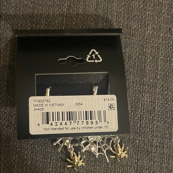 Napier Silver Starburst Earrings with Gold Accents - Picture 2 of 2